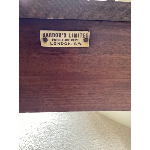 61 - An Edwardian mahogany inlaid bedroom suite bearing label for Harrods of London, comprising of a ward... 