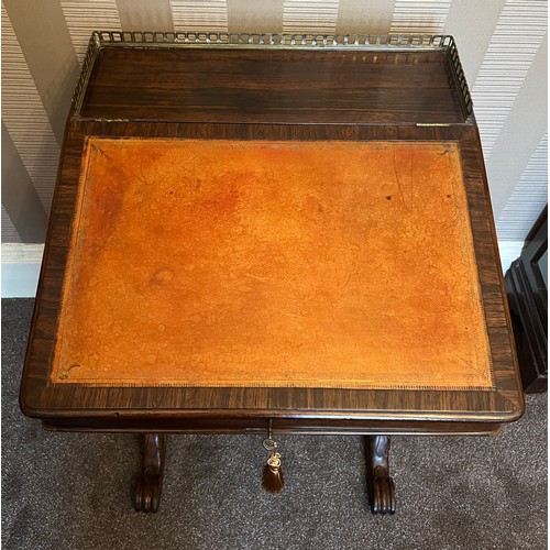 62 - A 19thC rosewood Davenport desk with tooled leather top and door to one side opening to reveal three... 