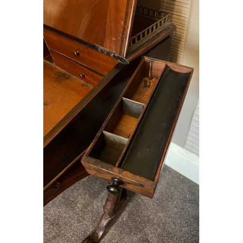 62 - A 19thC rosewood Davenport desk with tooled leather top and door to one side opening to reveal three... 