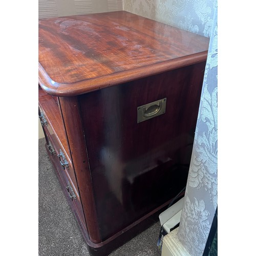 63 - A 19thC mahogany commode with brass handles and two false drawers to front. 68cm w x 52cm d x 69cm h... 