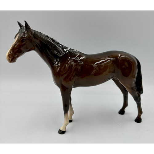 172 - A Beswick bay horse 20cm h together with three Royal Doulton bone china figurines: Sweet Sixteen HN ... 