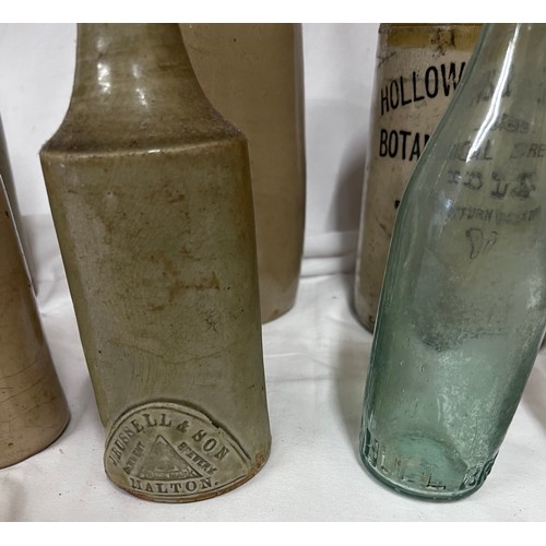 1341 - Various stoneware and glass bottles to include Barrow Bottling Co. Ltd. Stone Ginger Beer, Hollows &... 