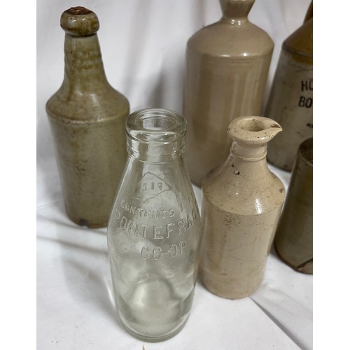 1341 - Various stoneware and glass bottles to include Barrow Bottling Co. Ltd. Stone Ginger Beer, Hollows &... 