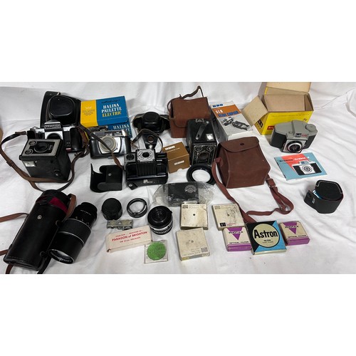 1258 - A collection of cameras, lenses and photography equipment to include Coronet Popular Twelve, Halina ... 