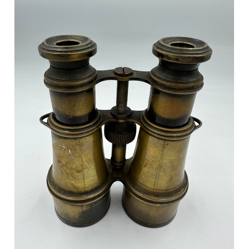 1212 - A pair of military binoculars marked with crows foot and MR. WIDE 31393.