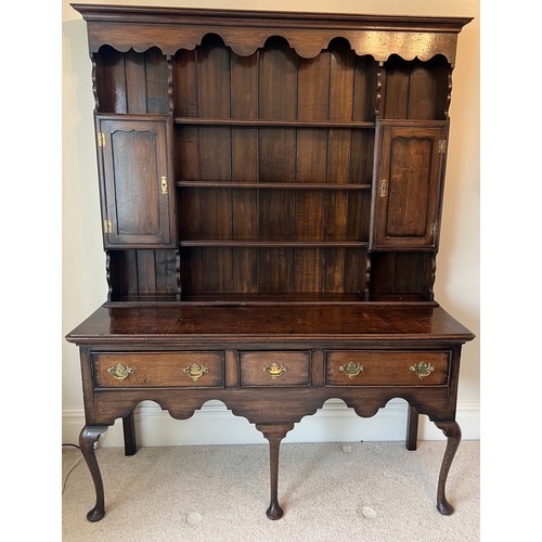 76 - A good quality oak dresser on cabriole legs, three drawers to front and plate rack. 153cm w x 51cm d... 