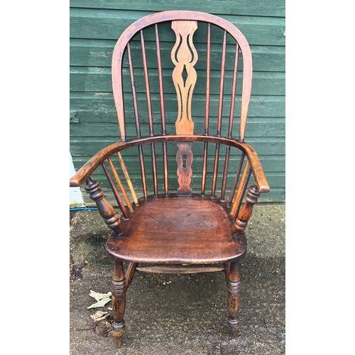 78 - A 19thC ash and elm high back windsor chair. 109cm h to back.