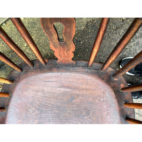 78 - A 19thC ash and elm high back windsor chair. 109cm h to back.