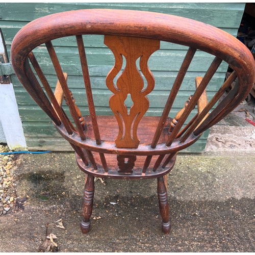 78 - A 19thC ash and elm high back windsor chair. 109cm h to back.