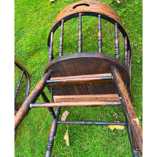 81 - A pair of 19thC spell backed elm chairs.