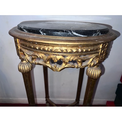 82 - Circular gilt table with marble top. 80cm h x 46cm d.