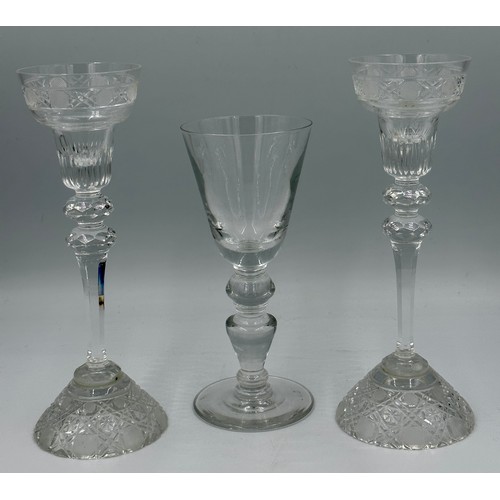 314 - Two crystal candlesticks, Meissen etched to base, approx 27cm h, together with a heavy baluster wine... 