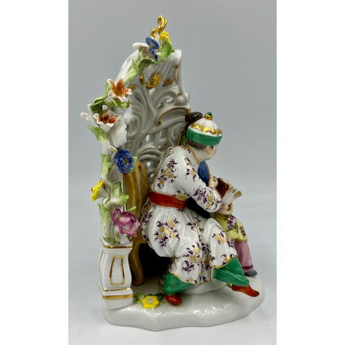 255 - A Meissen porcelain 20thC chinoiserie figure group of a Chinese couple sitting in a floral arbour wi... 