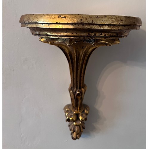 1315 - A pair of gilt wall brackets. 33cm h.