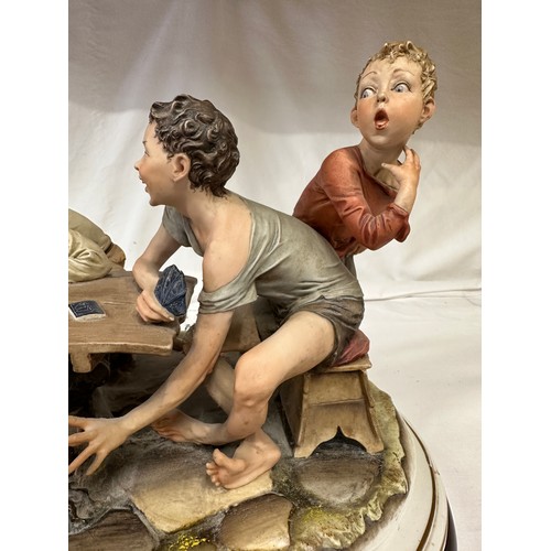 144 - Capodimonte - The Cheaters - A large 20thC Italian Capodimonte porcelain group figure entitled 'The ... 