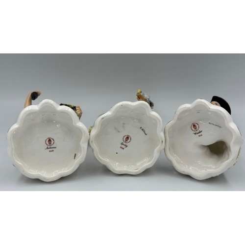 145 - Royal Crown Derby bone china figurines, three of the four seasons, signed by various artists - Autum... 