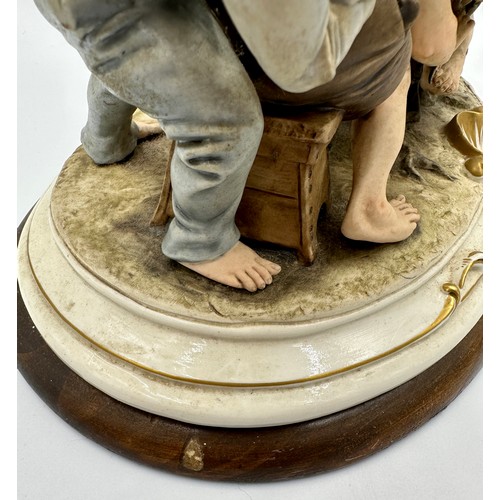 148 - Capodimonte - The Cheaters - A 20th century Italian Capodimonte porcelain group figure entitled 'The... 