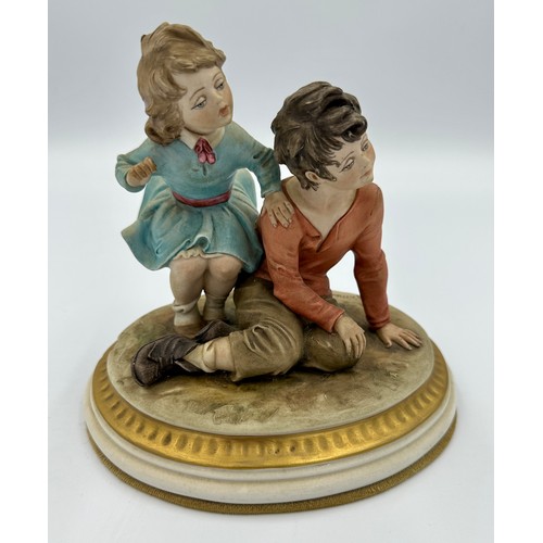 148 - Capodimonte - The Cheaters - A 20th century Italian Capodimonte porcelain group figure entitled 'The... 