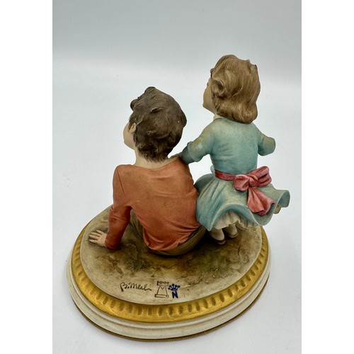 148 - Capodimonte - The Cheaters - A 20th century Italian Capodimonte porcelain group figure entitled 'The... 