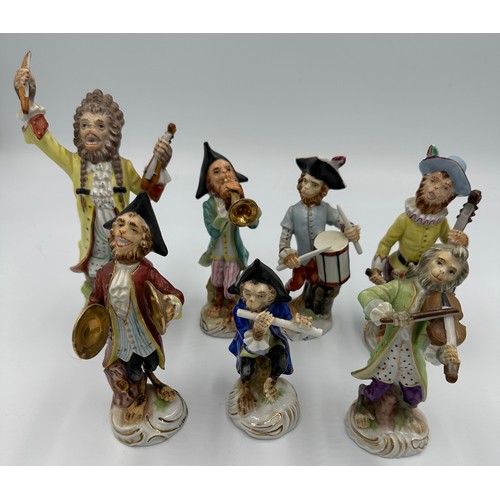 150 - Group of ceramic monkey figures making up a 7 piece Band, unmarked, tallest approx 21.5cm h.