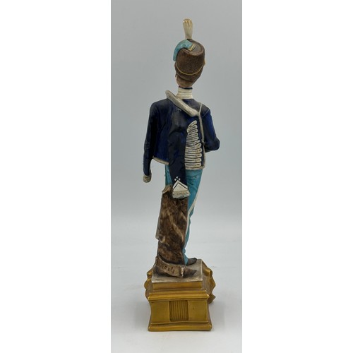 163 - Capodimonte Il Capitan Spavento approx 26cm h along with two Meli male figurines Napoleon and Nelson... 