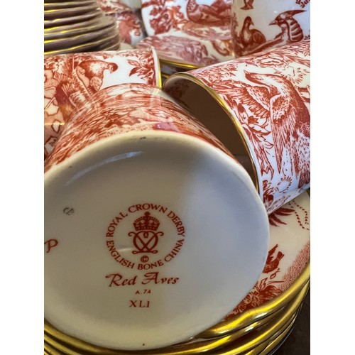 256 - A quantity of Royal Crown Derby red Aves pattern dinner and coffee service etc to include 6 x 27cm d... 