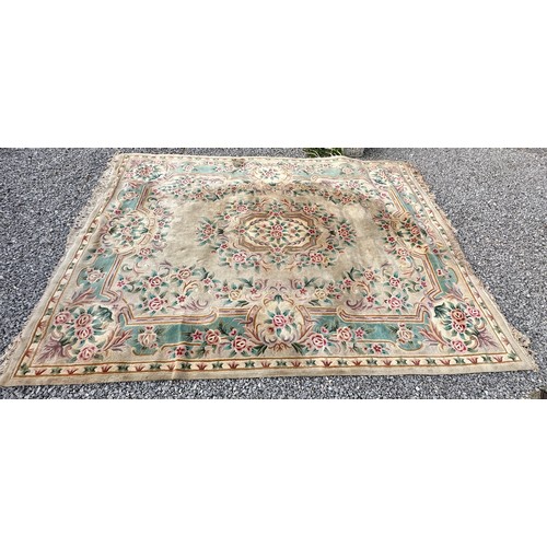 1238 - A large oriental wool carpet. 356 x 270cm.