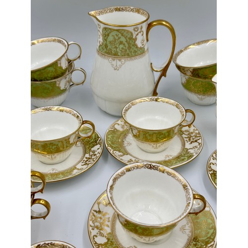 250 - Wedgwood pattern 85518 part china tea service 19thC green and gilt, comprising two jugs, 15.5cm h an... 