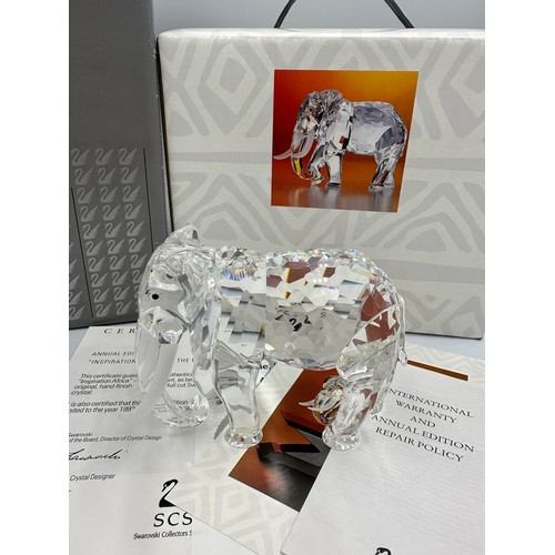 324 - Swarovski crystal, to include a boxed Cheetah, 7610 NR 000 001, 9.5cm h and a boxed elephant 