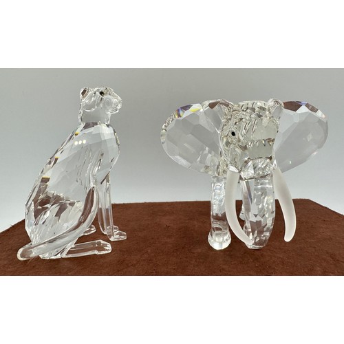 324 - Swarovski crystal, to include a boxed Cheetah, 7610 NR 000 001, 9.5cm h and a boxed elephant 