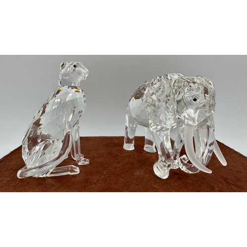 324 - Swarovski crystal, to include a boxed Cheetah, 7610 NR 000 001, 9.5cm h and a boxed elephant 