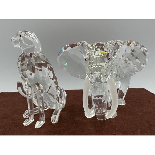 324 - Swarovski crystal, to include a boxed Cheetah, 7610 NR 000 001, 9.5cm h and a boxed elephant 