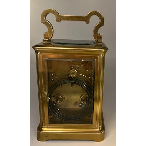 1271 - Brass carriage clock made in France for the English market with white enamel dial and visible escape... 