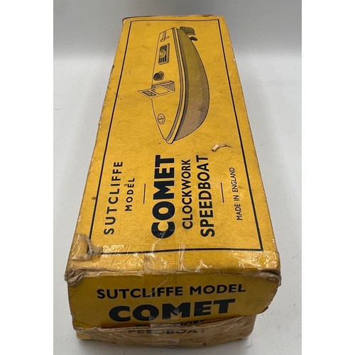 1104 - A vintage Comet Sutcliffe model clockwork speedboat in original box. Speedboat 24cm l.