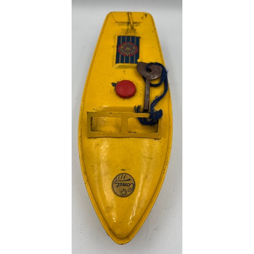 1104 - A vintage Comet Sutcliffe model clockwork speedboat in original box. Speedboat 24cm l.