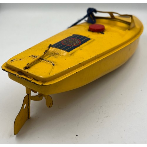 1104 - A vintage Comet Sutcliffe model clockwork speedboat in original box. Speedboat 24cm l.