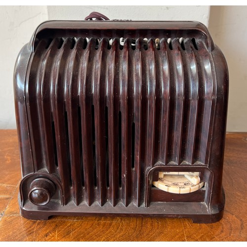 1253 - A Sobell Bakelite radio. 23cm x 18cm x 22cm h.