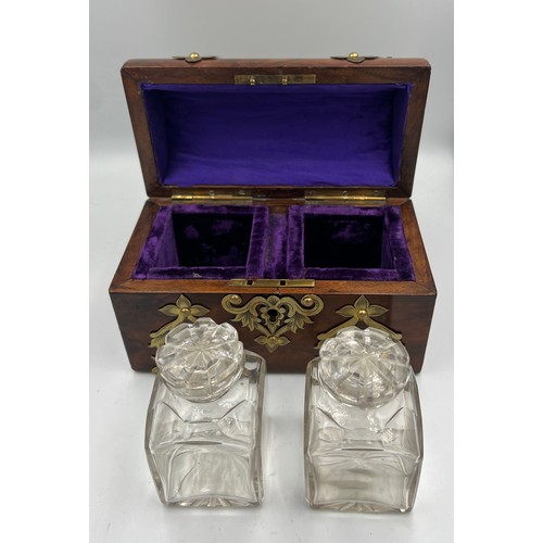 1174 - Victorian burr walnut brass bound domed topped casket containing two glass scent bottles and stopper... 