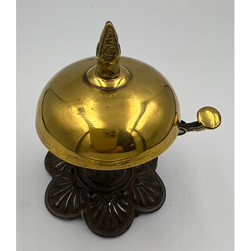 1178 - A late 19th/early 20thC brass and iron reception bell in good working order. 10cm h.