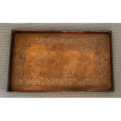 1181 - Copper tray by Keswick School of Industrial Art, a hammered centre with foliate border. Marked to re... 