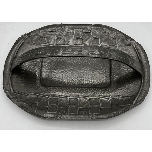 1183 - Archibald Knox pewter Tudric cake basket. 31cm x 22cm.