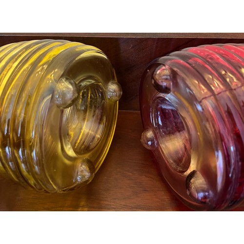 328 - Two early 20thC coloured glass wasp traps. 21cm h.