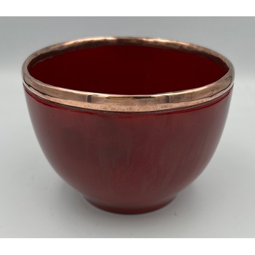 266 - A Bernard Moore flambé bowl with applied copper rim. 7.5cm h x 10cm d.