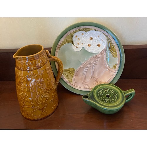 269 - Ceramics to include an Arts and Crafts green glazed pottery oil lamp impressed mark Liberty London, ... 