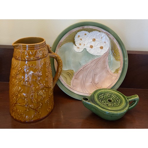 269 - Ceramics to include an Arts and Crafts green glazed pottery oil lamp impressed mark Liberty London, ... 