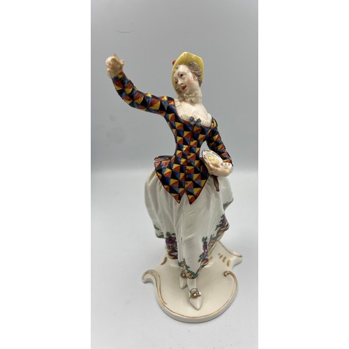 270 - A 20thC Nymphenburg Commedia dell’Arte figure of Columbine 20cm h.