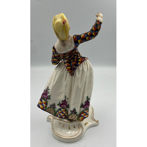 270 - A 20thC Nymphenburg Commedia dell’Arte figure of Columbine 20cm h.