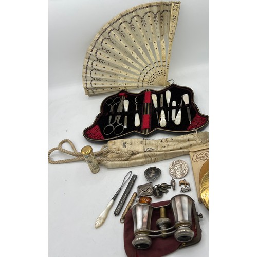 1300 - Miscellany comprising cased ladies sewing/manicure set, bone and sequinned fan in original case, Vog... 