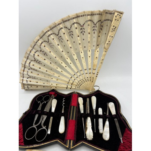 1300 - Miscellany comprising cased ladies sewing/manicure set, bone and sequinned fan in original case, Vog... 