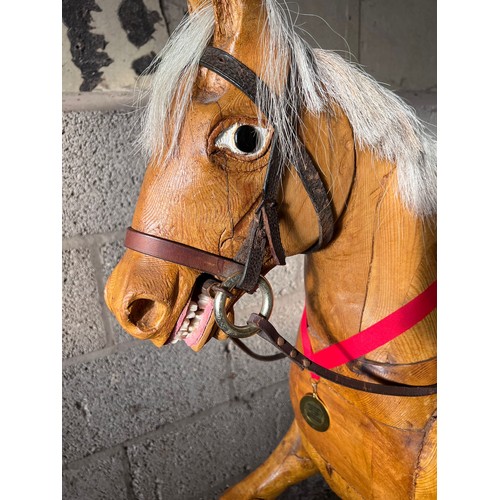 1101 - Large vintage wooden rocking horse with horse hair mane and tail, leather bridle and saddle. 121cm h... 